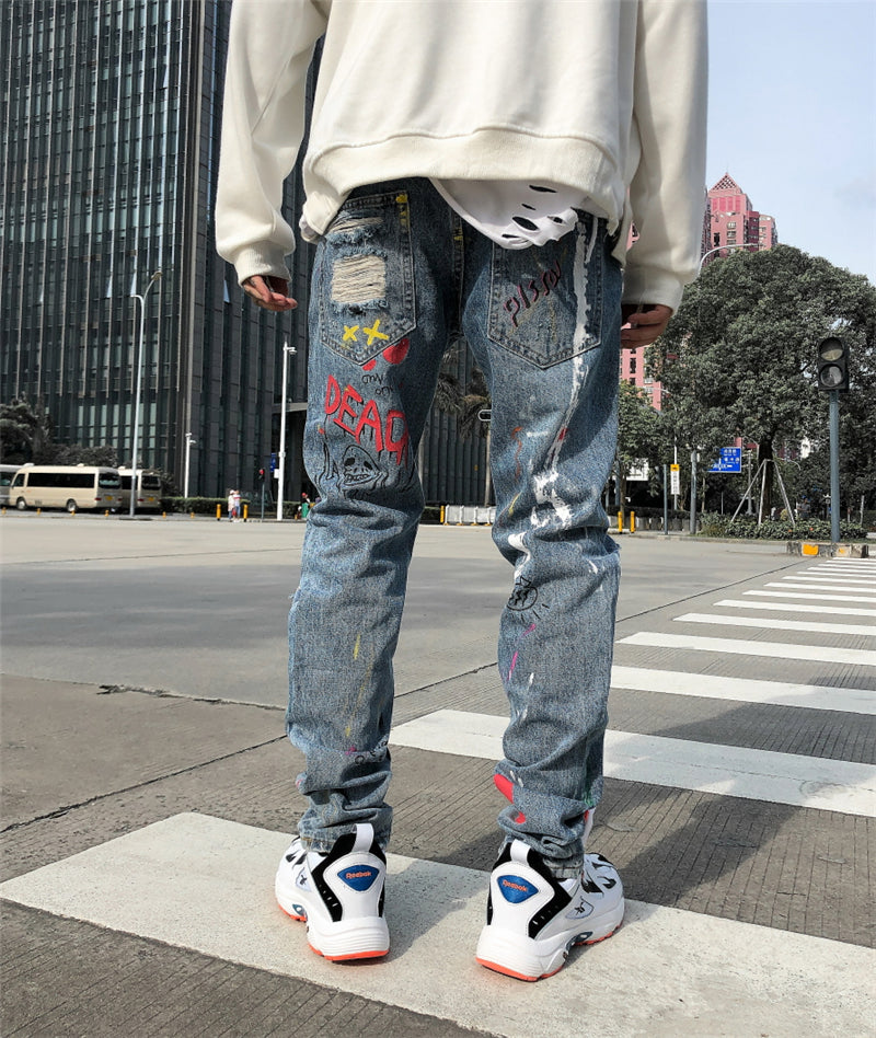 Hip Hop Streetwear Ripped Slim Fit Jeans Skinny Jeans Japan Graffiti Flame Skeleton Print Men Jogger Denim Pants